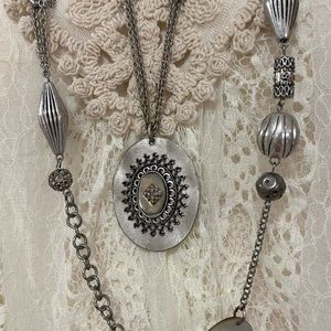 Silver long necklace w unique beads & oval statement piece